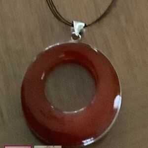 Red pendant In Glass On A Black Cord